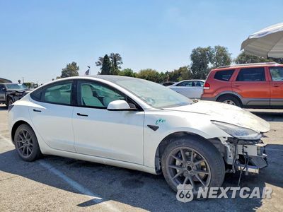 Czwarte zdjęcie samochodu z boku: 2022 TESLA MODEL 3 VIN:5YJ3E1EA6NF375650 - miniatura