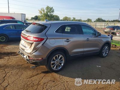 Trzecie zdjęcie samochodu z tyłu: 2019 LINCOLN MKC SELECT VIN:5LMCJ2C97KUL09890 - miniatura