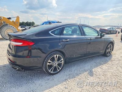 Trzecie zdjęcie samochodu z tyłu: 2020 FORD FUSION TITANIUM VIN:3FA6P0D9XLR153204 - miniatura