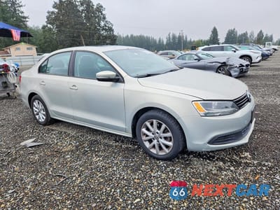 Czwarte zdjęcie samochodu z boku: 2011 VOLKSWAGEN JETTA SE VIN:3VWDZ7AJ9BM379164 - miniatura
