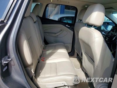 Zdjęcie 10 z 12 samochodu: 2014 FORD ESCAPE TITANIUM VIN:1FMCU0J92EUB31876 - miniatura