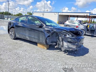 Czwarte zdjęcie samochodu z boku: 2023 TESLA MODEL 3 VIN:5YJ3E1EAXPF426151 - miniatura