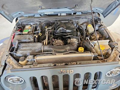 Zdjęcie 12 z 13 samochodu: 2014 JEEP WRANGLER UNLIMITED SAHARA VIN:1C4BJWEG7EL272923 - miniatura
