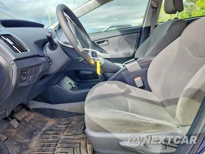 Zdjęcie 7 z 13 samochodu: 2015 TOYOTA PRIUS TWO VIN:JTDKN3DU4F0404663 - miniatura