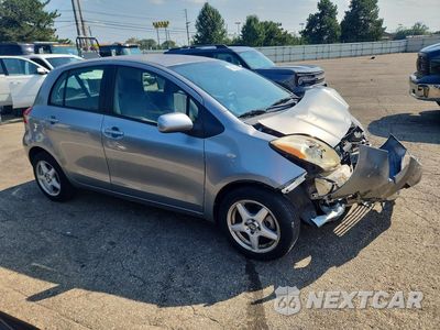 Czwarte zdjęcie samochodu z boku: 2010 TOYOTA YARIS BASE VIN:JTDKT4K38A5284884 - miniatura