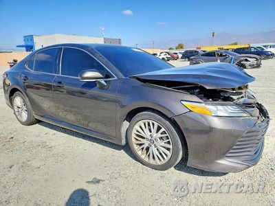 Czwarte zdjęcie samochodu z boku: 2019 TOYOTA CAMRY XLE VIN:4T1B11HK0KU257006 - miniatura