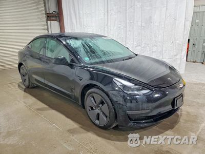 Czwarte zdjęcie samochodu z boku: 2022 TESLA MODEL 3 VIN:5YJ3E1EA9NF371169 - miniatura