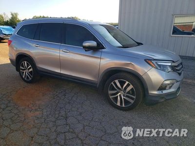 Czwarte zdjęcie samochodu z boku: 2017 HONDA PILOT TOURING VIN:5FNYF5H90HB005827 - miniatura
