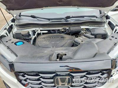 Zdjęcie 12 z 13 samochodu: 2022 HONDA PASSPORT ELITE VIN:5FNYF8H07NB005130 - miniatura