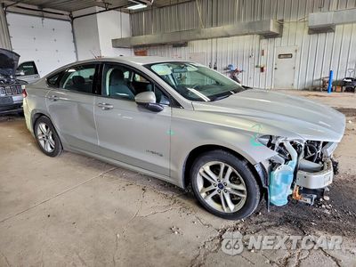 Czwarte zdjęcie samochodu z boku: 2018 FORD FUSION SE HYBRID VIN:3FA6P0LU5JR147605 - miniatura