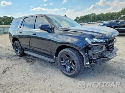 Czwarte zdjęcie samochodu z boku: 2022 CHEVROLET TAHOE C1500 VIN:1GNSCLED5NR206079 - miniatura