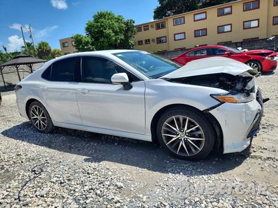 Czwarte zdjęcie samochodu z boku: 2023 TOYOTA CAMRY XLE VIN:4T1F11AK0PU790203 - miniatura