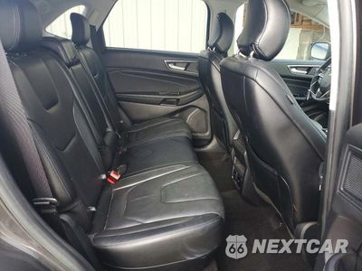 Zdjęcie 11 z 13 samochodu: 2019 FORD EDGE TITANIUM VIN:2FMPK4K95KBC37155 - miniatura