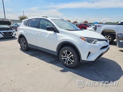 Czwarte zdjęcie samochodu z boku: 2016 TOYOTA RAV4 LE VIN:JTMZFREV5GJ062321 - miniatura