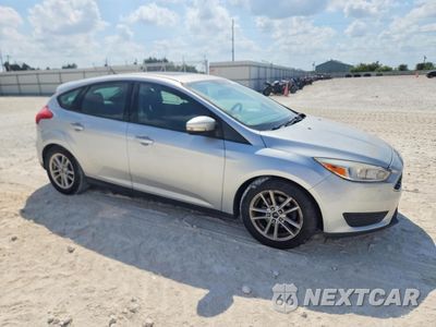 Czwarte zdjęcie samochodu z boku: 2016 FORD FOCUS SE VIN:1FADP3K21GL217035 - miniatura