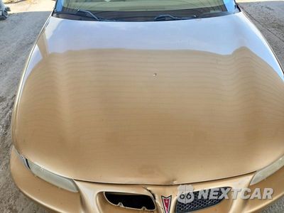 Zdjęcie 11 z 13 samochodu: 1999 PONTIAC GRAND PRIX GT VIN:1G2WP12K7XF219849 - miniatura