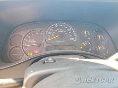 Zdjęcie 9 z 13 samochodu: 2004 CHEVROLET TAHOE C1500 VIN:1GNEC13Z94R321024 - miniatura