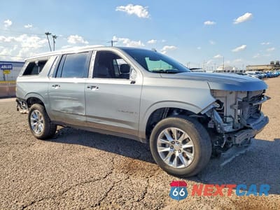 Czwarte zdjęcie samochodu z boku: 2023 CHEVROLET SUBURBAN C1500 PREMIER VIN:1GNSCFKDXPR520805 - miniatura