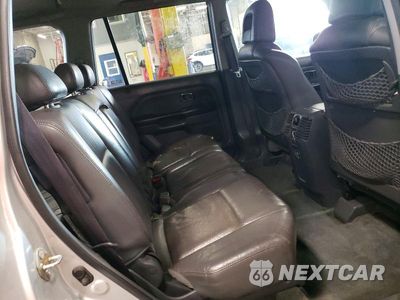 Zdjęcie 11 z 14 samochodu: 2005 HONDA PILOT EXL VIN:2HKYF18545H538928 - miniatura