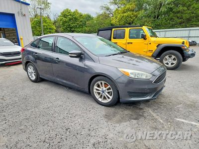 Czwarte zdjęcie samochodu z boku: 2016 FORD FOCUS SE VIN:1FADP3F20GL284039 - miniatura