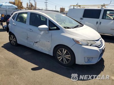 Czwarte zdjęcie samochodu z boku: 2016 HONDA FIT EX VIN:JHMGK5H76GX029526 - miniatura