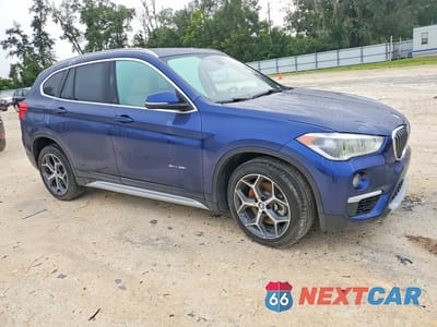 Czwarte zdjęcie samochodu z boku: 2018 BMW X1 SDRIVE28I VIN:WBXHU7C37J5H45179 - miniatura