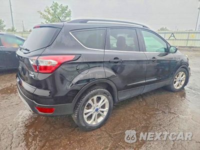 Trzecie zdjęcie samochodu z tyłu: 2018 FORD ESCAPE SE VIN:1FMCU0GD4JUC87472 - miniatura