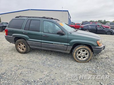 Czwarte zdjęcie samochodu z boku: 2000 JEEP GRAND CHEROKEE LAREDO VIN:1J4G248S3YC334937 - miniatura