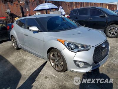 Czwarte zdjęcie samochodu z boku: 2013 HYUNDAI VELOSTER TURBO VIN:KMHTC6AE4DU136241 - miniatura
