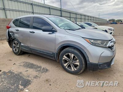 Czwarte zdjęcie samochodu z boku: 2017 HONDA CR-V LX VIN:7FARW5H37HE008566 - miniatura