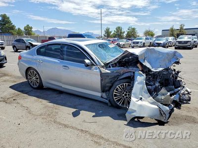 Czwarte zdjęcie samochodu z boku: 2020 BMW 530E VIN:WBAJA9C09LCE05505 - miniatura