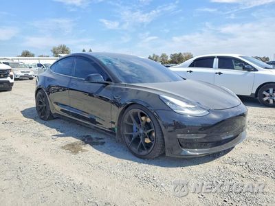 Czwarte zdjęcie samochodu z boku: 2019 TESLA MODEL 3 VIN:5YJ3E1EB9KF384752 - miniatura