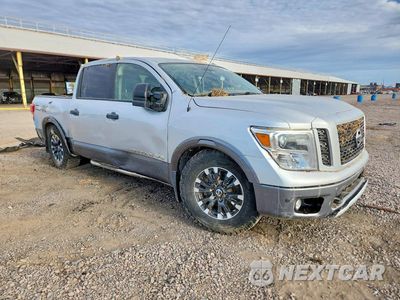 Czwarte zdjęcie samochodu z boku: 2019 NISSAN TITAN PRO-4X VIN:1N6AA1E53KN512317 - miniatura