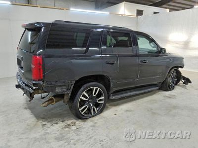 Trzecie zdjęcie samochodu z tyłu: 2019 CHEVROLET TAHOE C1500 PREMIER VIN:1GNSCCKJ4KR105346 - miniatura