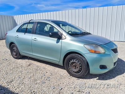 Czwarte zdjęcie samochodu z boku: 2010 TOYOTA YARIS BASE VIN:JTDBT4K39A4072856 - miniatura