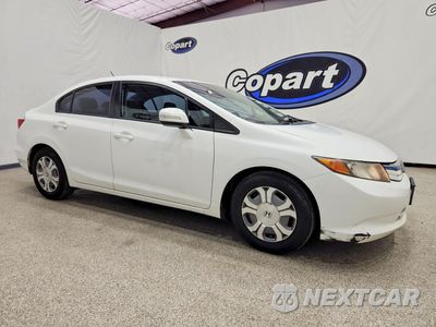 Czwarte zdjęcie samochodu z boku: 2012 HONDA CIVIC HYBRID VIN:JHMFB4F23CS000277 - miniatura