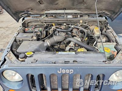 Zdjęcie 11 z 13 samochodu: 2008 JEEP WRANGLER UNLIMITED SAHARA VIN:1J4GA59188L608759 - miniatura