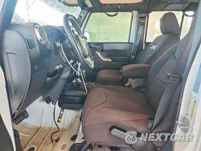 Zdjęcie 7 z 12 samochodu: 2017 JEEP WRANGLER UNLIMITED SAHARA VIN:1C4BJWEG0HL573411 - miniatura