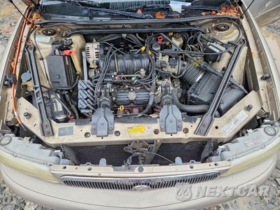 Zdjęcie 11 z 12 samochodu: 1999 BUICK REGAL LS VIN:2G4WB52K1X1490278 - miniatura