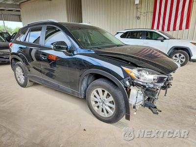 Czwarte zdjęcie samochodu z boku: 2014 MAZDA CX-5 SPORT VIN:JM3KE2BE3E0418520 - miniatura