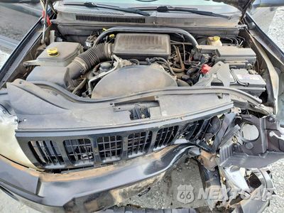 Zdjęcie 12 z 13 samochodu: 2005 JEEP GRAND CHEROKEE LAREDO VIN:1J4HR48N65C601798 - miniatura