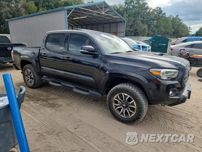 Czwarte zdjęcie samochodu z boku: 2022 TOYOTA TACOMA TRD SPORT VIN:3TMCZ5AN7NM518153 - miniatura