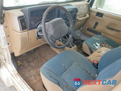 Zdjęcie 8 z 13 samochodu: 2002 JEEP WRANGLER / TJ SAHARA VIN:1J4FA59S32P760002 - miniatura