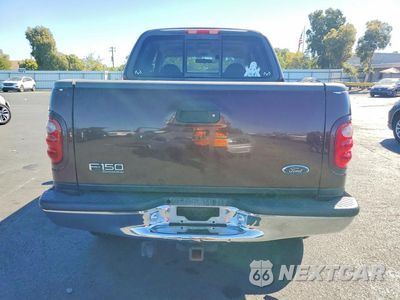Zdjęcie 6 z 12 samochodu: 2001 FORD F150 SUPERCREW VIN:1FTRW08L01KD70410 - miniatura