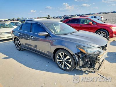 Czwarte zdjęcie samochodu z boku: 2016 NISSAN ALTIMA 2.5 SR VIN:1N4AL3AP3GC280343 - miniatura
