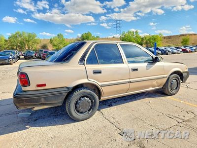 Trzecie zdjęcie samochodu z tyłu: 1989 TOYOTA COROLLA DELUXE VIN:1NXAE92E6KZ063257 - miniatura