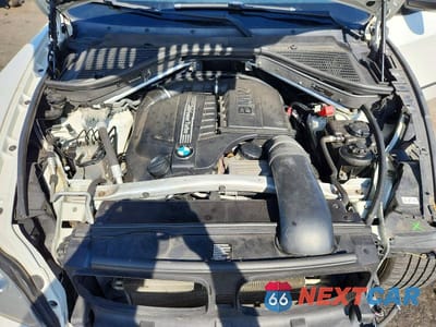 Zdjęcie 12 z 13 samochodu: 2012 BMW X5 XDRIVE35I VIN:5UXZV4C54CL990417 - miniatura