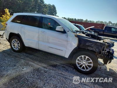 Czwarte zdjęcie samochodu z boku: 2014 JEEP GRAND CHEROKEE LAREDO VIN:1C4RJEAGXEC274471 - miniatura