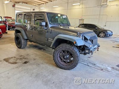 Czwarte zdjęcie samochodu z boku: 2014 JEEP WRANGLER UNLIMITED SPORT VIN:1C4BJWDG1EL289363 - miniatura
