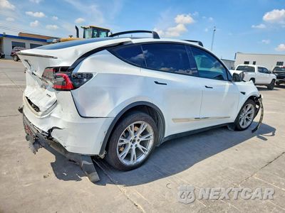 Trzecie zdjęcie samochodu z tyłu: 2023 TESLA MODEL Y VIN:7SAYGDEE8PA131019 - miniatura